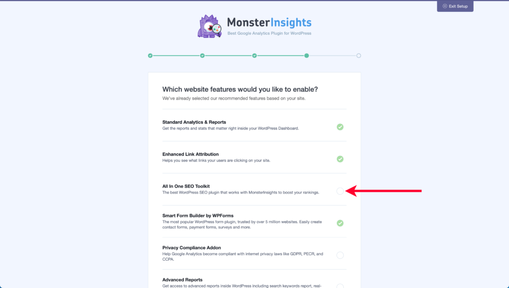 Pointing Out Box to Uncheck on Fourth Step of MonsterInsights Wizard